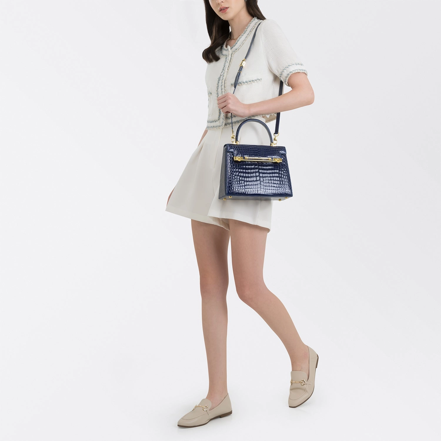 RAFFLES 1819 HANDBAG