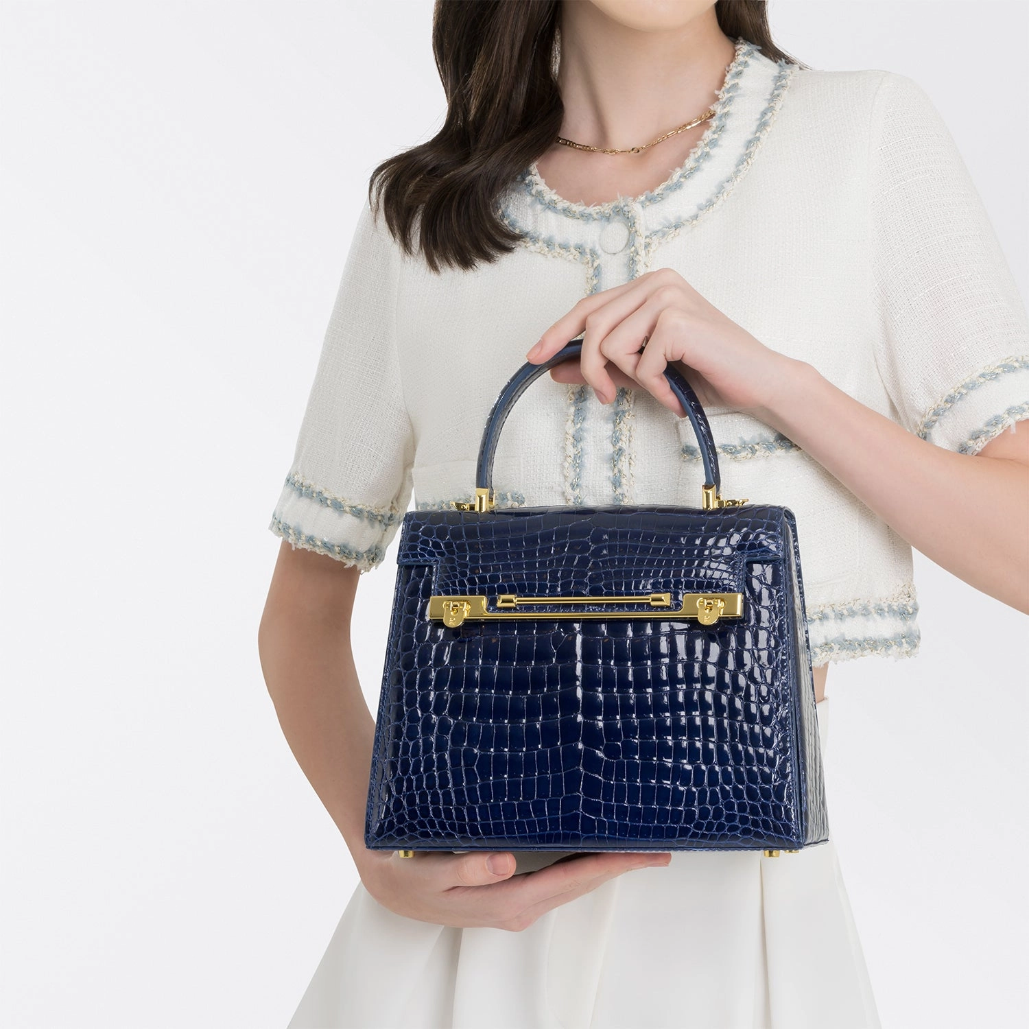 RAFFLES 1819 HANDBAG